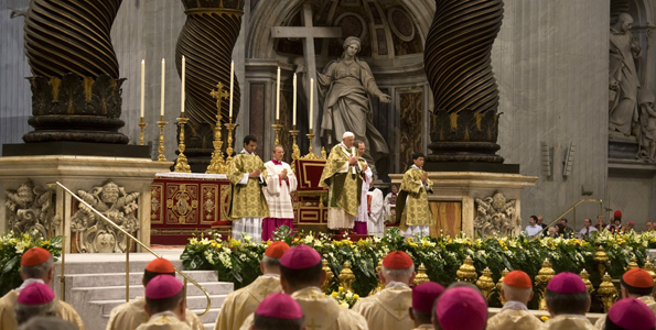 Pope Benedict XVI prays as he leads a mass to celebrate the end of the Synod of the Bishops in Saint Peter's Basilica at the Vatican